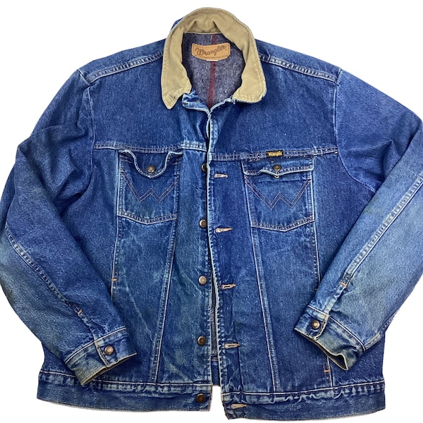 Vintage Wrangler blanket lined denim jacket. Two front slide pockets, two front chest pockets. Corduroy collar. High-quality