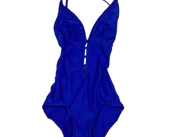Vintage Jantzen 90s cobalt blue one piece swimsuit. Made in the USA. Tagged as a size 8, measures as a small. No rips or tears. Gold toned