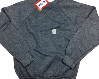 Vintage 80s Tultex Raglan crewneck sweatshirt. Made in the USA. Dead stock, tags still on. Dark heather gray. Small