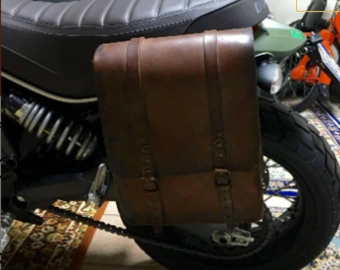 Ducati scrambler left side bag in aged leather with patina effect. Special cafe racer