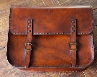 Aged Tuscan leather saddlebag. Hepco & Becker support. Handmade in Italy.