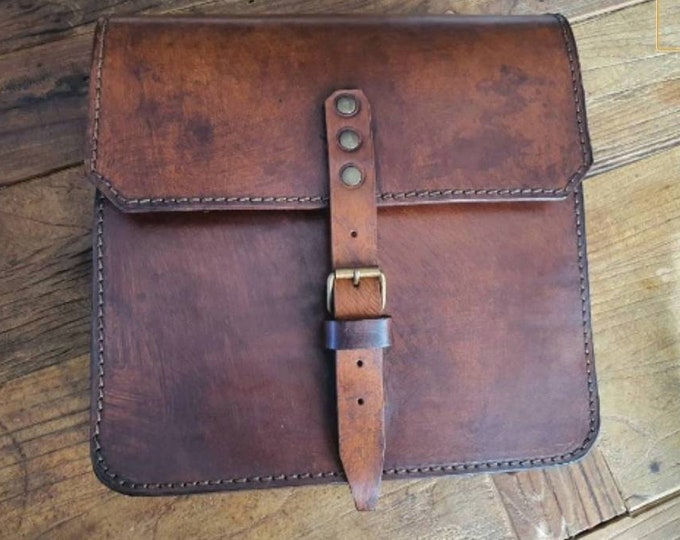 Aged leather side motorcycle bag for Cafe Racer and Scrambler Cafe racer and Scrambler saddle bag.