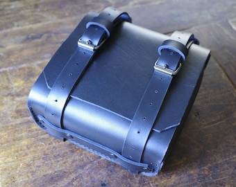 Black leather scrambler trunk. Entirely handmade. Hand made in Italy.