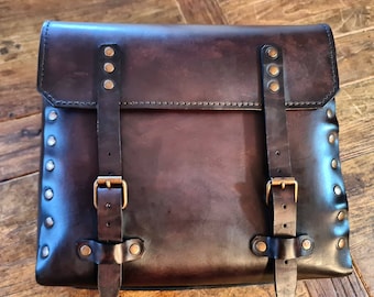Dark walnut Tuscan leather motorcycle side bag with brass rivets. Hand-made in Italy.