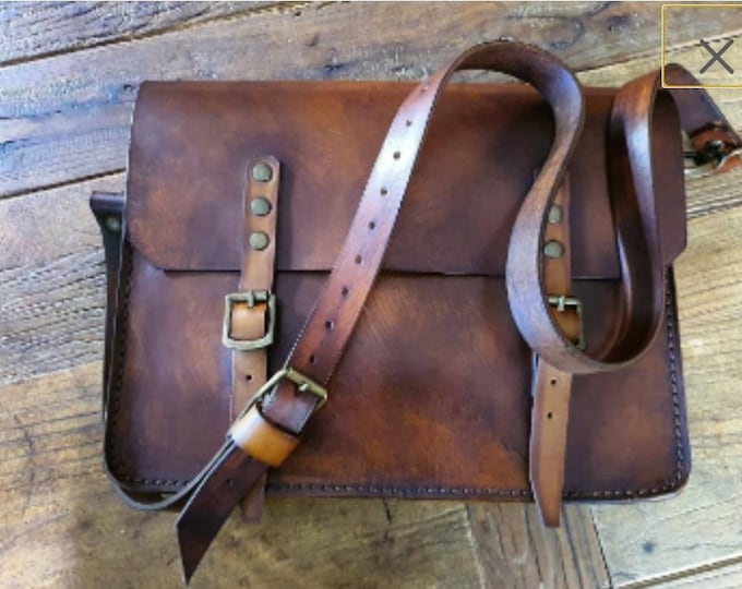 Leather Messenger bag vintage style. Rustic brown color and patina effect. Hand made.