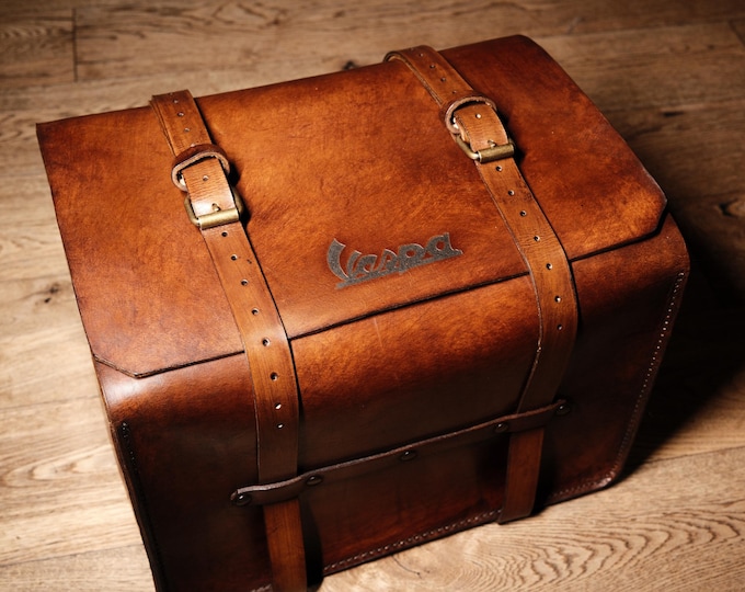 Piaggio Vespa top case in aged leather.