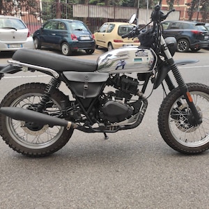 Brixton 125 series right side bag side cover flank. café racer scrambler. Leather color BLACK