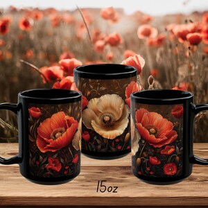 May include: Three black 15oz mugs featuring a poppy flower design. The mugs have a dark background with red, orange, and yellow poppy flowers.