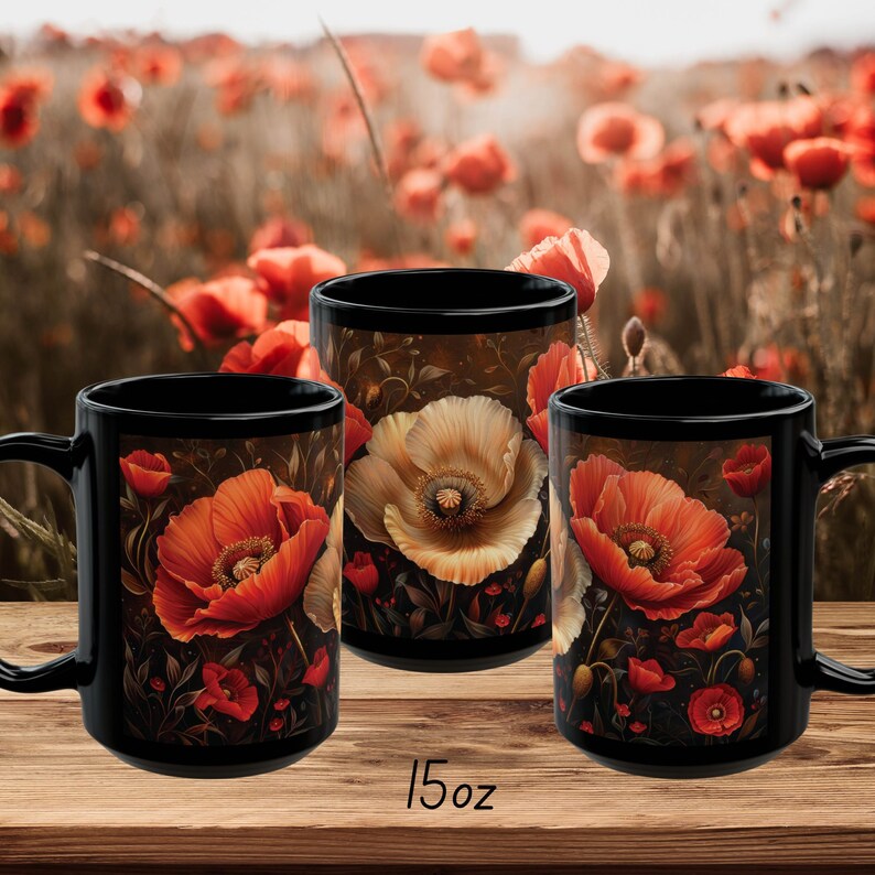 May include: Three black 15oz mugs featuring a poppy flower design. The mugs have a dark background with red, orange, and yellow poppy flowers.