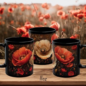 May include: Three black ceramic mugs with different poppy flower designs. Each mug features a detailed illustration of a poppy flower with a brown background. The mugs are 11 ounces.