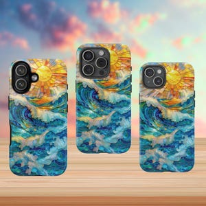May include: Three phone cases with a vibrant stained-glass design of a sun over ocean waves. The cases feature a colorful palette of blues, yellows, and oranges, creating a dynamic and artistic aesthetic. The cases are displayed on a wooden surface.
