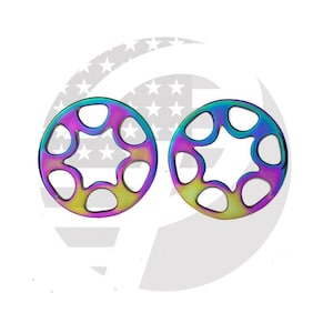 May include: Two iridescent rainbow colored metal star-shaped wheel spacers with six holes around the perimeter.