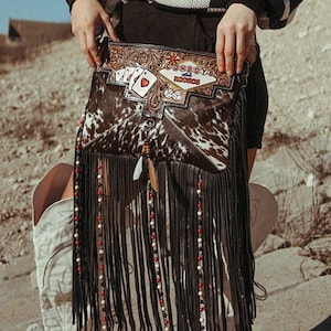 Cowboys and Rodeos a Haute Southern Hyde by Beth Marie Exclusive Cowhide Fringe Tooled Purse image 1