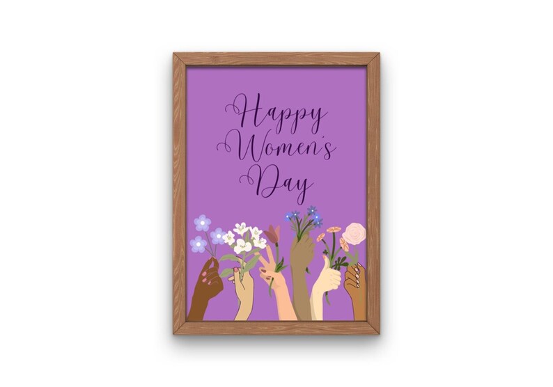 May include: A framed print with a purple background and the text "Happy Women's Day".  The print features a group of hands holding flowers in various colors.