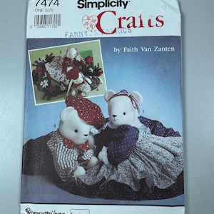 May include: A Simplicity Crafts pattern featuring teddy bear designs. The cover includes the text "FANNY'S FABRICS" and "by Faith Van Zanten." The pattern shows images of the finished bears in various outfits. The pattern is labeled "7474" and "ONE SIZE."