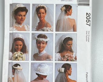 McCalls 2057 FF Bridal Veils. Included in this package are instructions and pattern pieces to make 8 different veil headpieces and One hat.