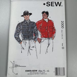 May include: A Kwik Sew pattern 2000, featuring illustrations of two shirts. One shirt is a plaid button-up, and the other is a red button-up. The pattern sizes are S-M-L-XL. The pattern is designed by Kerstin Martensson.