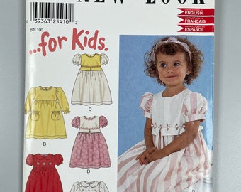Simplicity 6136 FF New Look for Kids Dress Lovely toddler and Children’s Dresses variations sizes Size 1/2 -1-2-3-4 Chest 19-23” Pattern