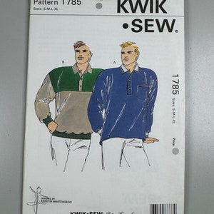 May include: A sewing pattern for a long-sleeved shirt with a collar. The pattern is for sizes S-M-L-XL and is from Kwik Sew Pattern Co., Inc. The pattern shows two different shirt styles, one in blue and one in green and tan.