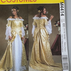 May include: A McCall's Costumes pattern envelope featuring a gold and white off-the-shoulder gown with lace sleeves and a long skirt. The envelope displays the pattern number M4414 and size EE (14-16-18-20).