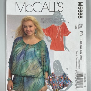 May include: A sewing pattern for a women's blouse with three different styles. The pattern is for sizes 18W-20W-22W-24W. The pattern is from McCall's and is labeled M5666.