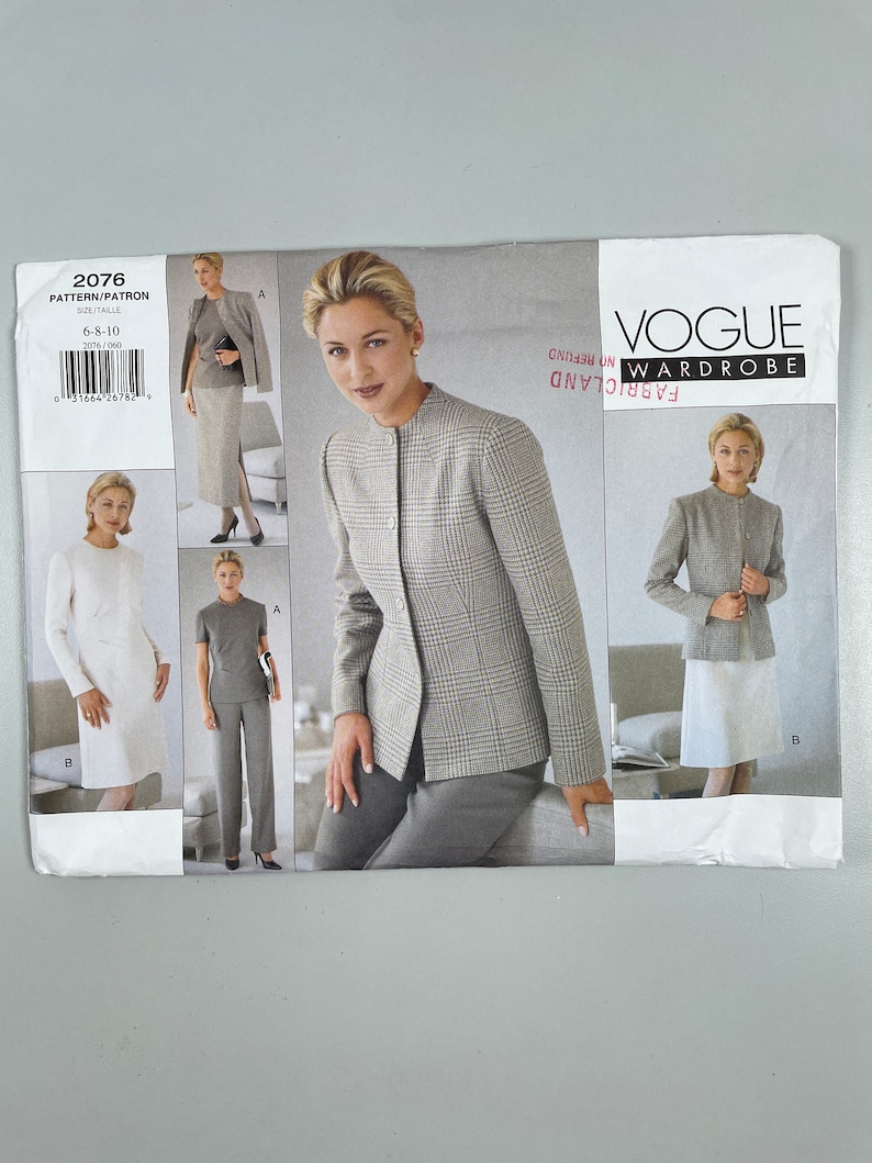 May include: A sewing pattern for a blazer and skirt or trousers. The pattern is from Vogue and is for sizes 6-8-10. The pattern shows a woman wearing a blazer and skirt, a blazer and trousers, and a skirt and top.