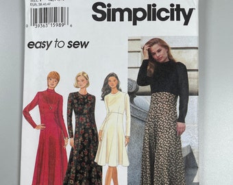 Simplicity 9196 FF Uncut Easy to Sew Miss Petite Dress. In two lengths princess seamed skirt raised waistline long sleeved back zip 12-14-16