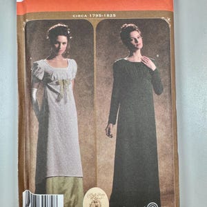 May include: A Simplicity sewing pattern envelope 4055 for dresses circa 1795-1825. The front shows two dress styles: a light-coloured short-sleeved dress with a ribbon and a dark long-sleeved dress. Includes size HH 6, 8, 10, 12 and EUR 32-38, FR 34-40.