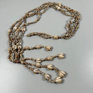 Vintage Macrame Sea Shell 36” L Plant Hanger. Very good condition.