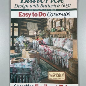 May include: A vintage sewing pattern cover featuring a living room with two floral patterned couches, a coffee table, and a footstool. The cover is titled "Easy to Do Cover-ups" and "Couettes Faciles à Faire" with the Butterick logo and the pattern number 6031. The text "At Home with Waverly Easy to Do Patterns" is also included.