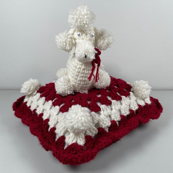 Vintage White Poodle Crochet Doggie sitting on a Burgandy and White Crochet Decor. 11 x 11 x 10 H. Googling Eyes. Soft yet firm pillow.