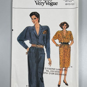 Vogue 9368 FF Uncut Misses Dress Sizes: 8–10-12. Loose Fitting Straight Blouson Dress Front Pockets.
