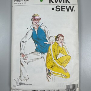 May include: A sewing pattern for a tracksuit with a blue and white jacket and yellow trousers. The pattern is called Kwik Sew and is designed by Kerstin Martensson. The pattern number is 816 and the sizes are S, M, L, and XL.