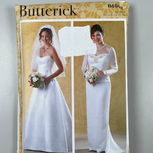 Może przedstawiać: Wzór sukni ślubnej z dwoma różnymi stylami. Pierwszy styl to straplessowa suknia balowa z dekoltem w kształcie serca. Drugi styl to suknia z długimi rękawami, dekoltem w kształcie serca i dopasowanym gorsetem. Wzór jest dla rozmiarów 6-14.