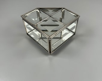 Vintage Beveled Glass Trinket Lidded Jewelry Box. Silver metal mirrors bottom. In Good condition for age. Nice size for counter tops.
