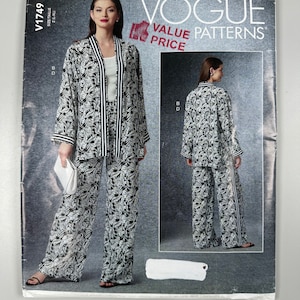 May include: Vogue Value Patterns sewing pattern for a black and white printed pantsuit with a long-sleeved jacket and wide-leg pants. The pattern number is V1749.