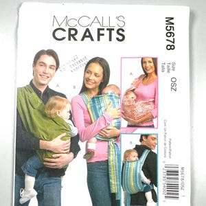 Carregadores de bebê McCall’s M5678 FF Uncut Crafts (não indicados para bebês com menos de quatro meses de idade) Costure várias maneiras de carregar crianças.