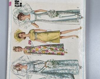 Simplicity 6352 Misses Wedding Dress with Detachable Train or Bridesmaids dresses Grad or evening gowns. Size 14 bust 34”. Some cut.