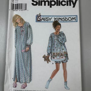 May include: Simplicity sewing pattern 7931 for Daisy Kingdom sleepwear. The envelope features illustrations of a long-sleeved nightgown and a matching top and shorts set, both with a blue and white striped pattern with small dark polka dots.