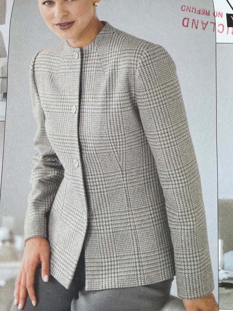 May include: A grey and white checked blazer with a stand-up collar and button fastening.