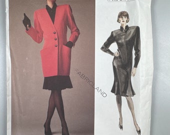 May include: Vogue Patterns sewing pattern envelope featuring a Christian Dior design. The envelope shows a black and white illustration of a woman wearing a black dress and a red illustration of a woman wearing a red jacket and skirt. The text on the envelope reads "Vogue Patterns Paris Original" and "Christian Dior". The sewing rating is "Advanced/Plus Difficult" and the pattern number is 1948.