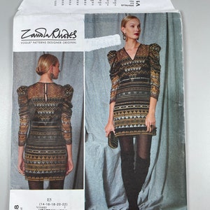 May include: A sewing pattern for a dress with a geometric print. The pattern is for sizes 14-16-18-20-22 and is from Vogue Patterns. The pattern is by Zandra Rhodes.