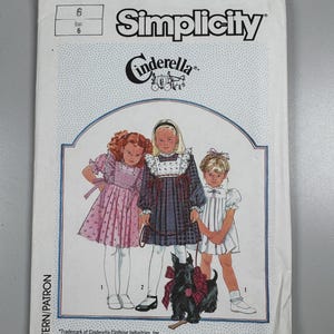 Simplicity 7891 FF Childs Dress n Doll Dress for 17” Doll. Sizes 3-4-5-6. Full Gathered Skirt, Peter Pan Collar. Puffy Sleeves Daisy Kingdom