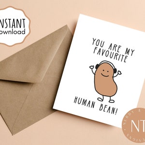 May include: A white card with a brown bean character wearing headphones and the text "You are my favourite human bean!"