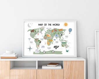 May include: A framed world map print with a white border. The map is light green with illustrations of animals and landmarks. The text "MAP OF THE WORLD" is at the top. The image includes a sun, moon, and hot air balloon.
