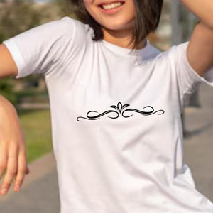 May include: White t-shirt with a black decorative design on the front.