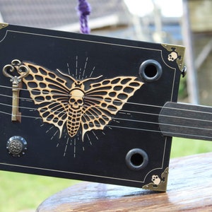 Chitarra cigar box, cbg, chitarra cigar box, chitarra, scatola sigarette,