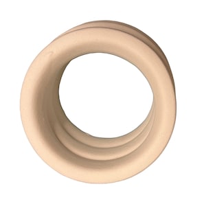 May include: A light beige, circular wooden ring with a ridged texture. The ring is viewed from a slightly elevated angle, showcasing its three-dimensional form and smooth, natural finish. The object is isolated against a white background.