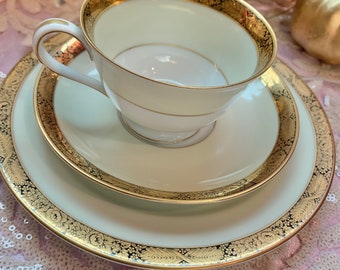 Beautiful Noritake Goldkin (4985) c. 1948-1975 discontinued 3-piece set: footed teacup, saucer, salad plate. Like new condition