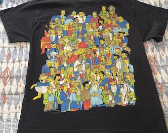 Camiseta de manga corta negra con el elenco completo de Los Simpson para adultos, talla MED, 2007, Delta.